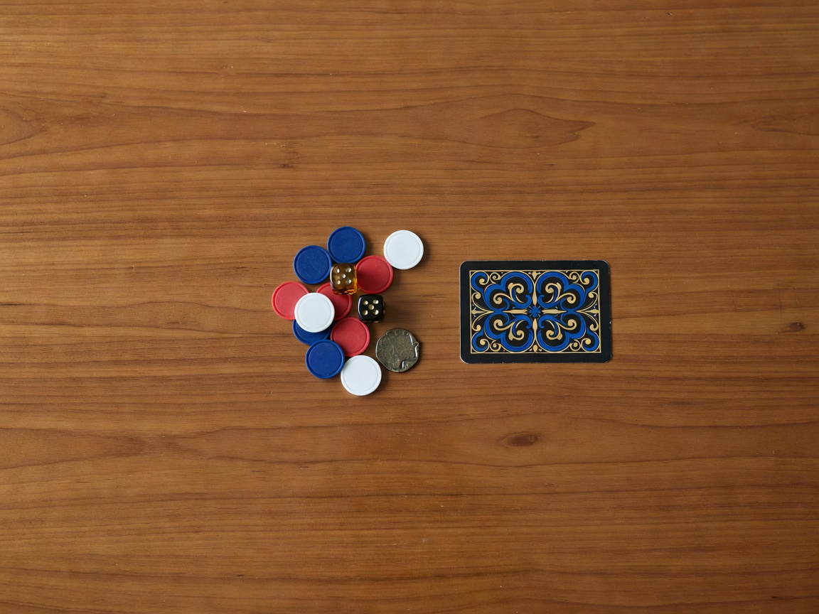 Wider crop of the same arrangement with clear space around the token cluster and card